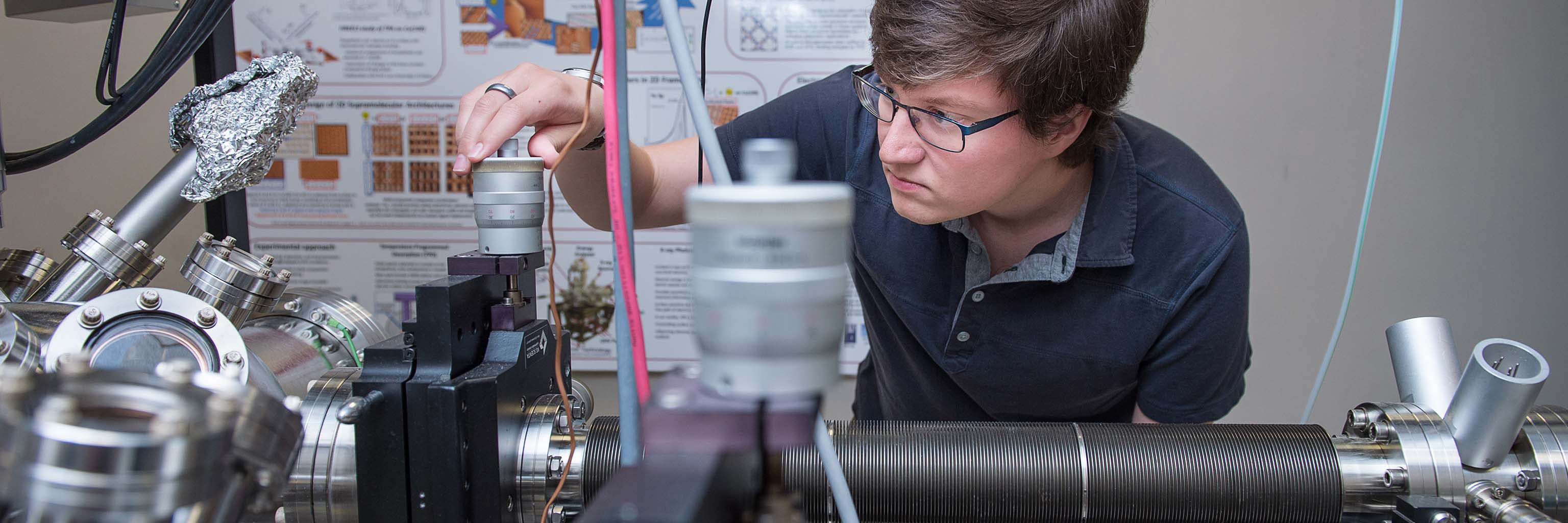 Student working on a machine