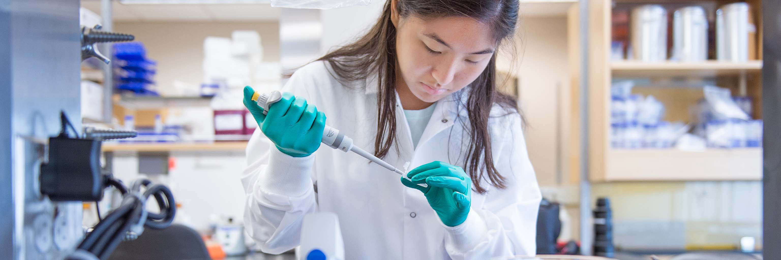 Student using a pipette