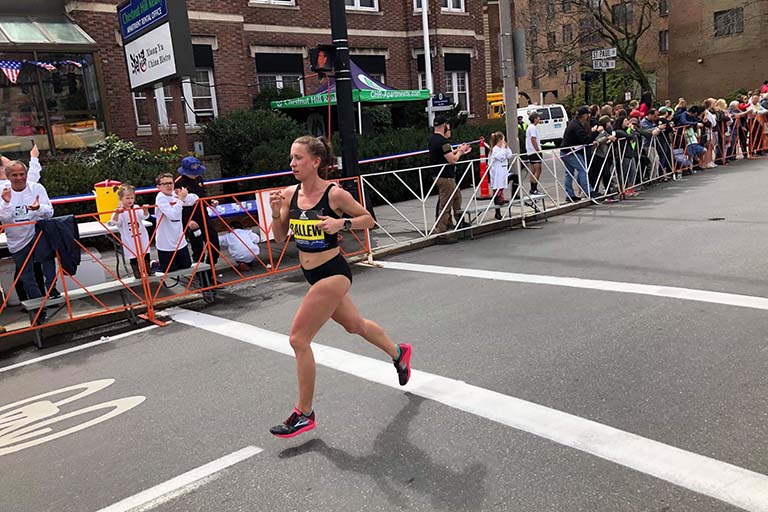 Olivia Ballew running in the 2019 Boston Marathon.