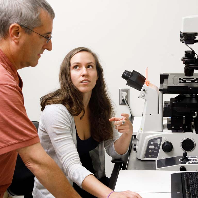 Courtney Ellison in the lab with her mentor Yves Brun.