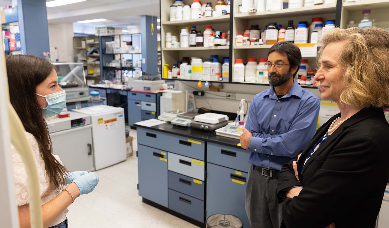 Elena Sullivan, biology major and undergraduate researcher in the Calvi lab, talks about her project using Drosophila as a cancer model with IU President Pamela Whitten and Professor Brian Calvi, principal investigator on FlyBase.