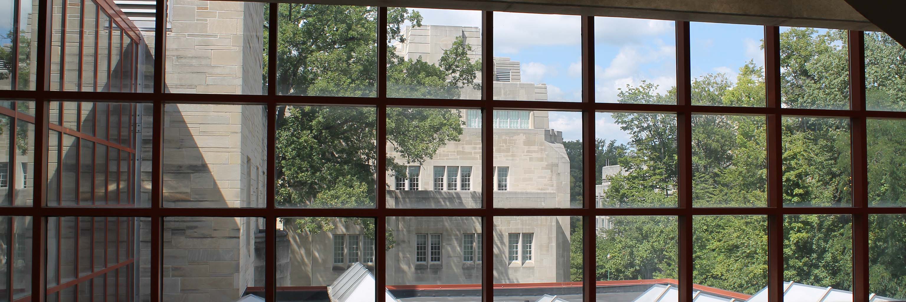 Looking through the upper Jordan Hall atrium windows westward to Simon Hall.