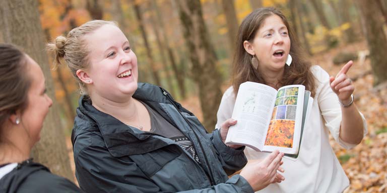 Students in forest talking