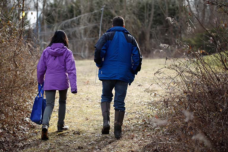 Researchers walking a transect to collect juncos from mist nets. Photo credit: Eric Rudd, IU Communications